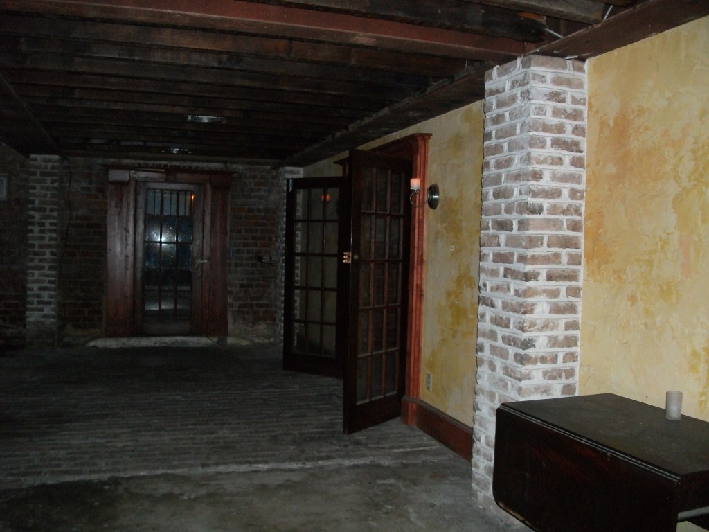 in the basement where the kitchens used to be and where the slaves slept.