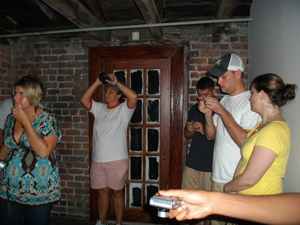 Another questionable one. This was in the Carriage house in Molly's bedroom. She was a slave found hanging from a beam from the ceiling. She was the mistress of the the man of the house and the wife found the two of them together then killed herself. Notice the people you can see. Just a few women and a younger man with a hat on right? Next picture is zoomed in.